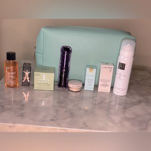 Various Travel Size Beauty Products Plus Cosmetic Bag
